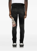 Jeans AMIRI,Ripped Graphic Jeans