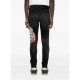 Jeans AMIRI,Ripped Graphic Jeans - AMBMJE1049097