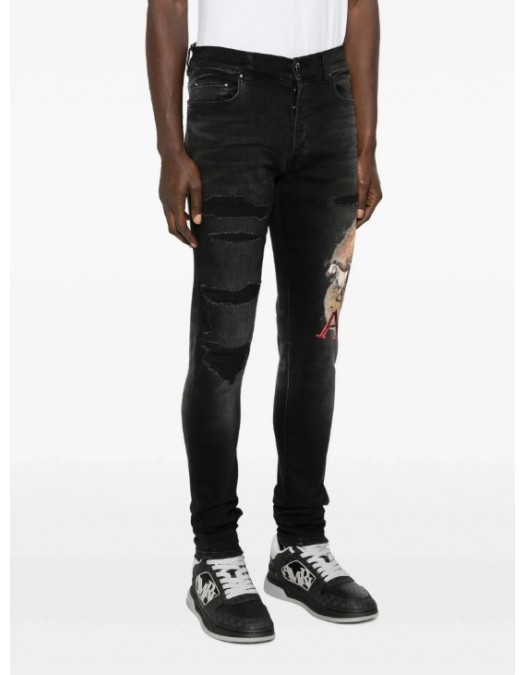 Jeans AMIRI,Ripped Graphic Jeans - AMBMJE1049097
